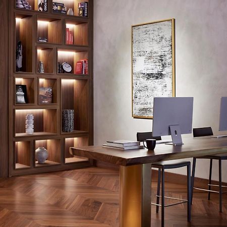 Movenpick Jumeirah Village Triangle ドバイ エクステリア 写真 The library at the hotel
