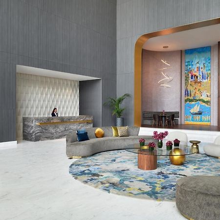 Movenpick Jumeirah Village Triangle ドバイ エクステリア 写真 The lobby of the hotel