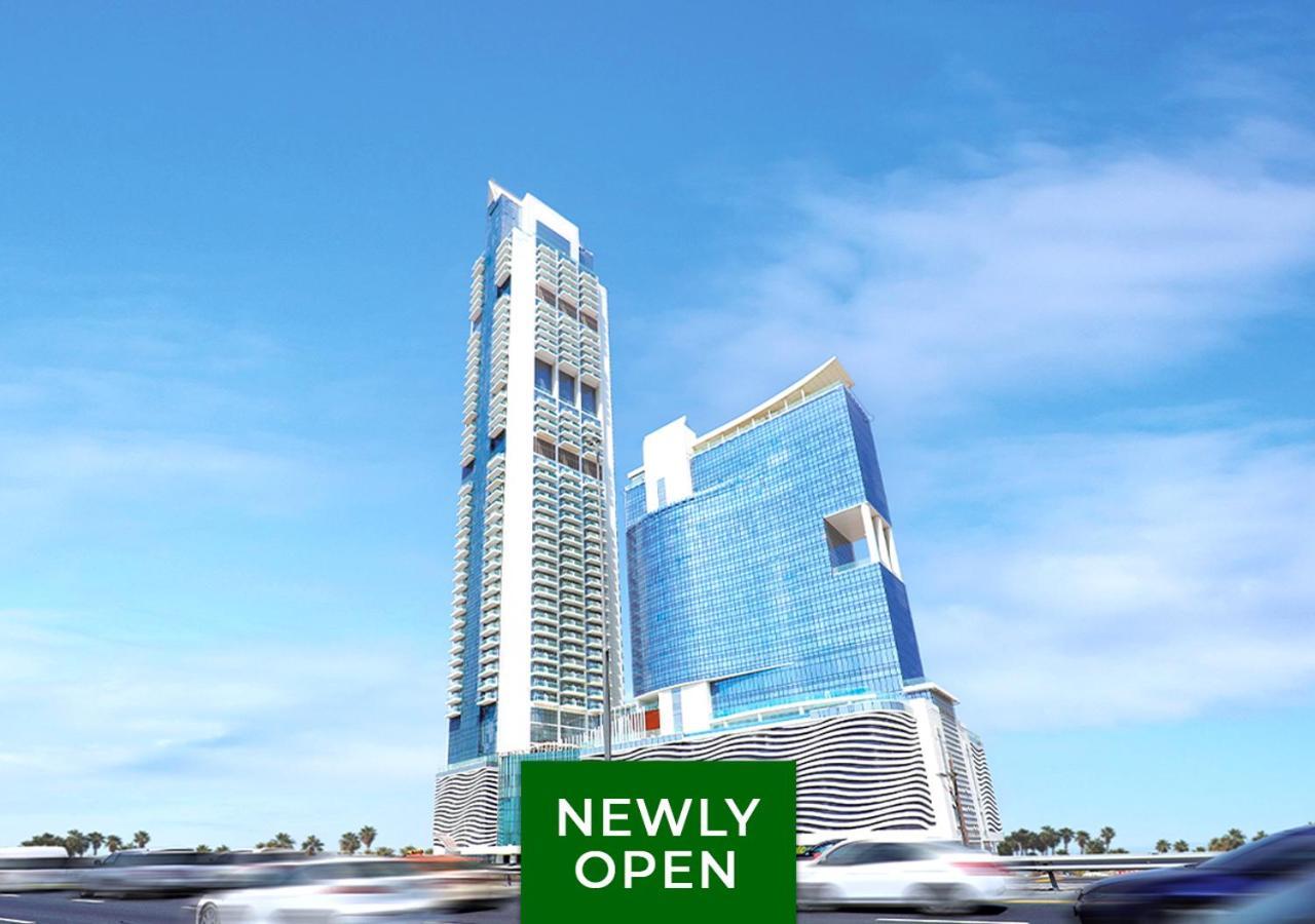 Movenpick Jumeirah Village Triangle ドバイ エクステリア 写真 The 101 Tower