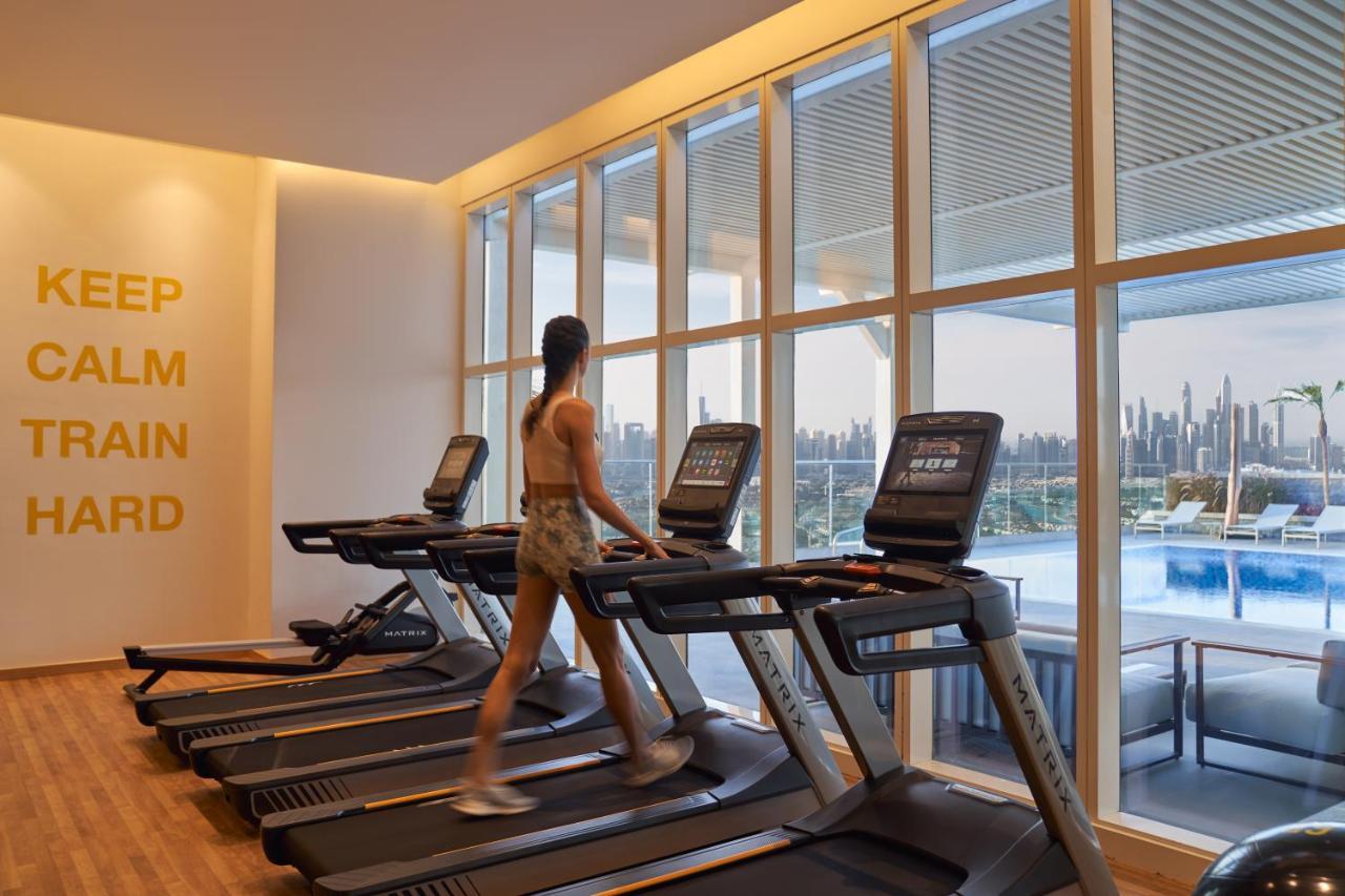 Movenpick Jumeirah Village Triangle ドバイ エクステリア 写真 The gym at the hotel