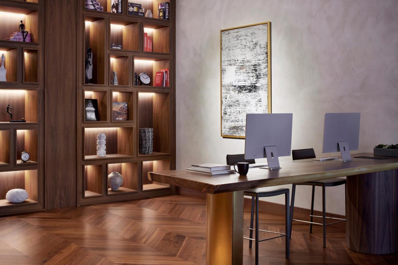 Movenpick Jumeirah Village Triangle ドバイ エクステリア 写真 The library at the hotel