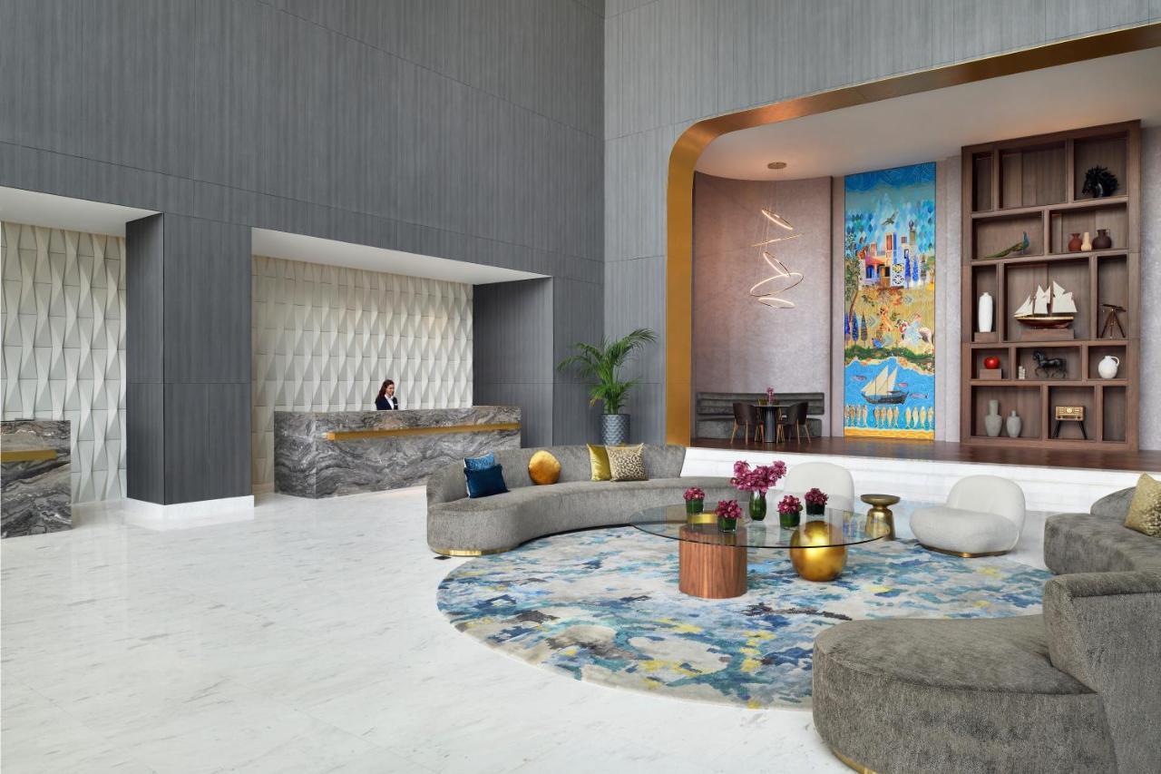 Movenpick Jumeirah Village Triangle ドバイ エクステリア 写真 The lobby of the hotel