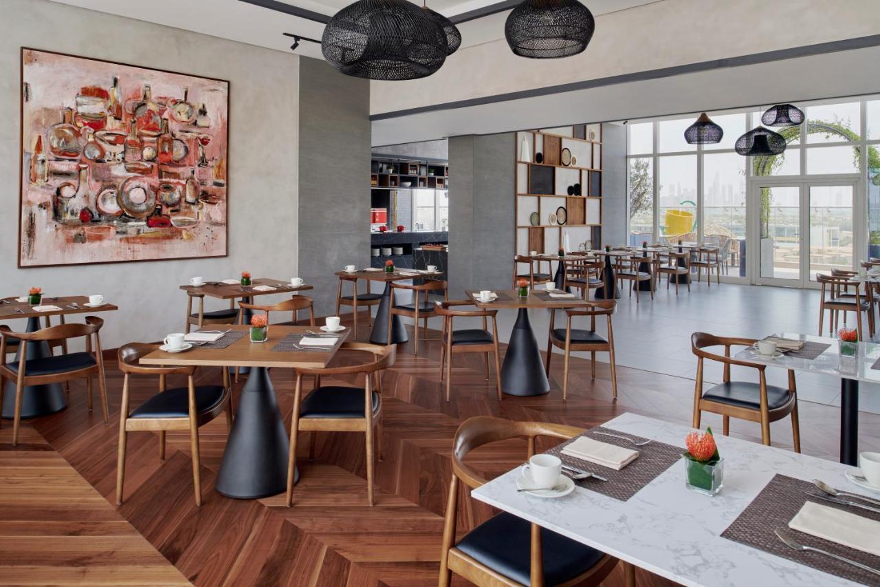 Movenpick Jumeirah Village Triangle ドバイ エクステリア 写真 The restaurant