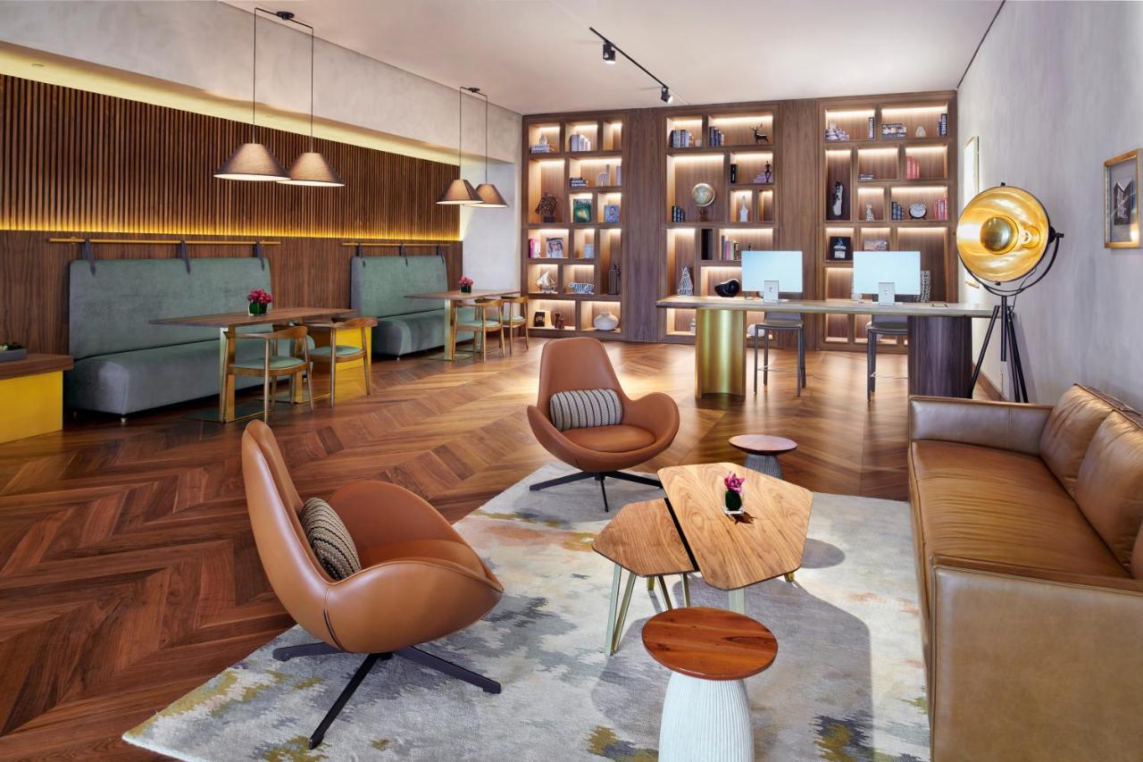 Movenpick Jumeirah Village Triangle ドバイ エクステリア 写真 The Library at The Hari
